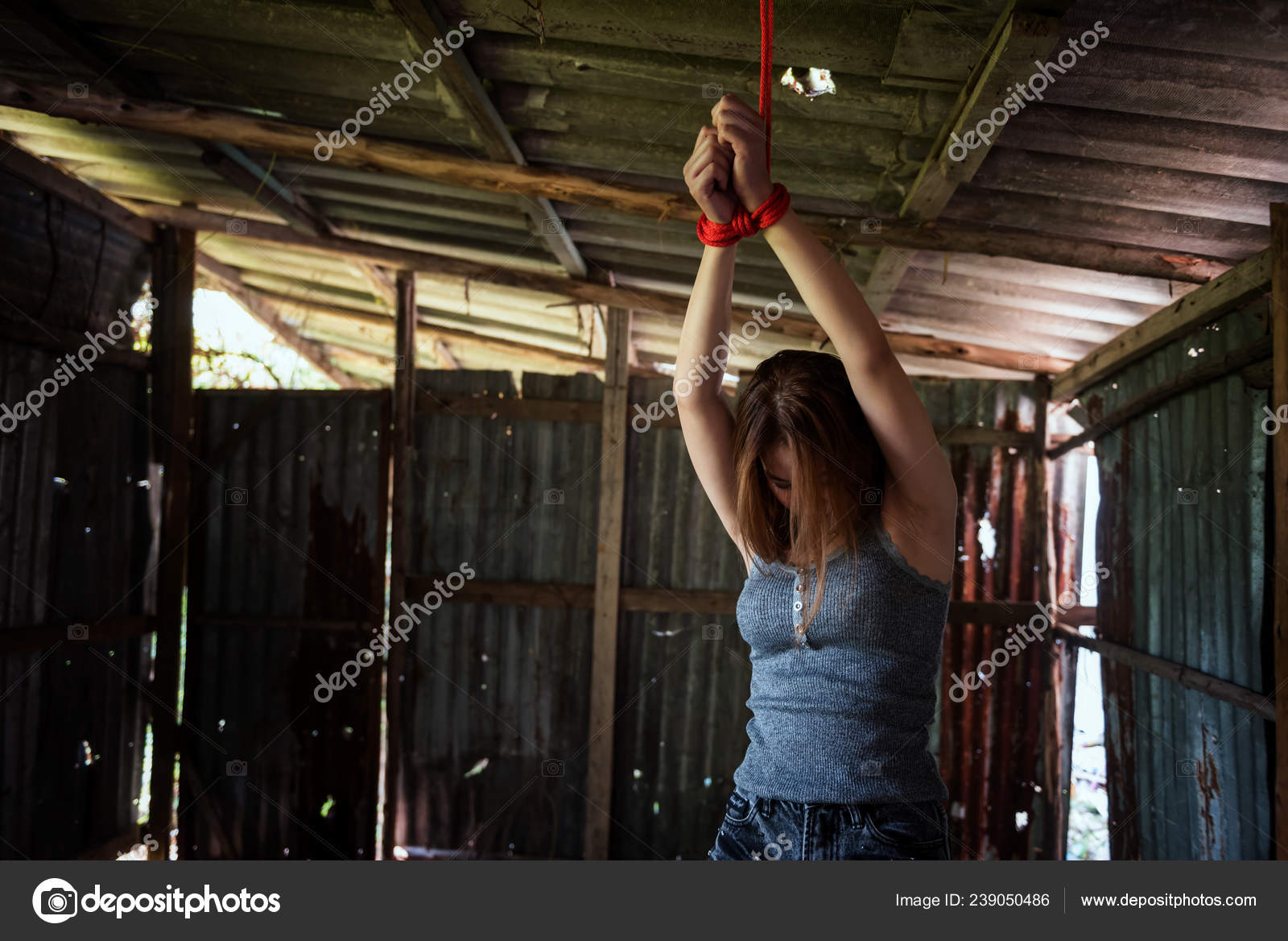Stressed Asian Woman Tied Hands Red Rope Dirty Roof Ceiling Stock Photo By Blanscape