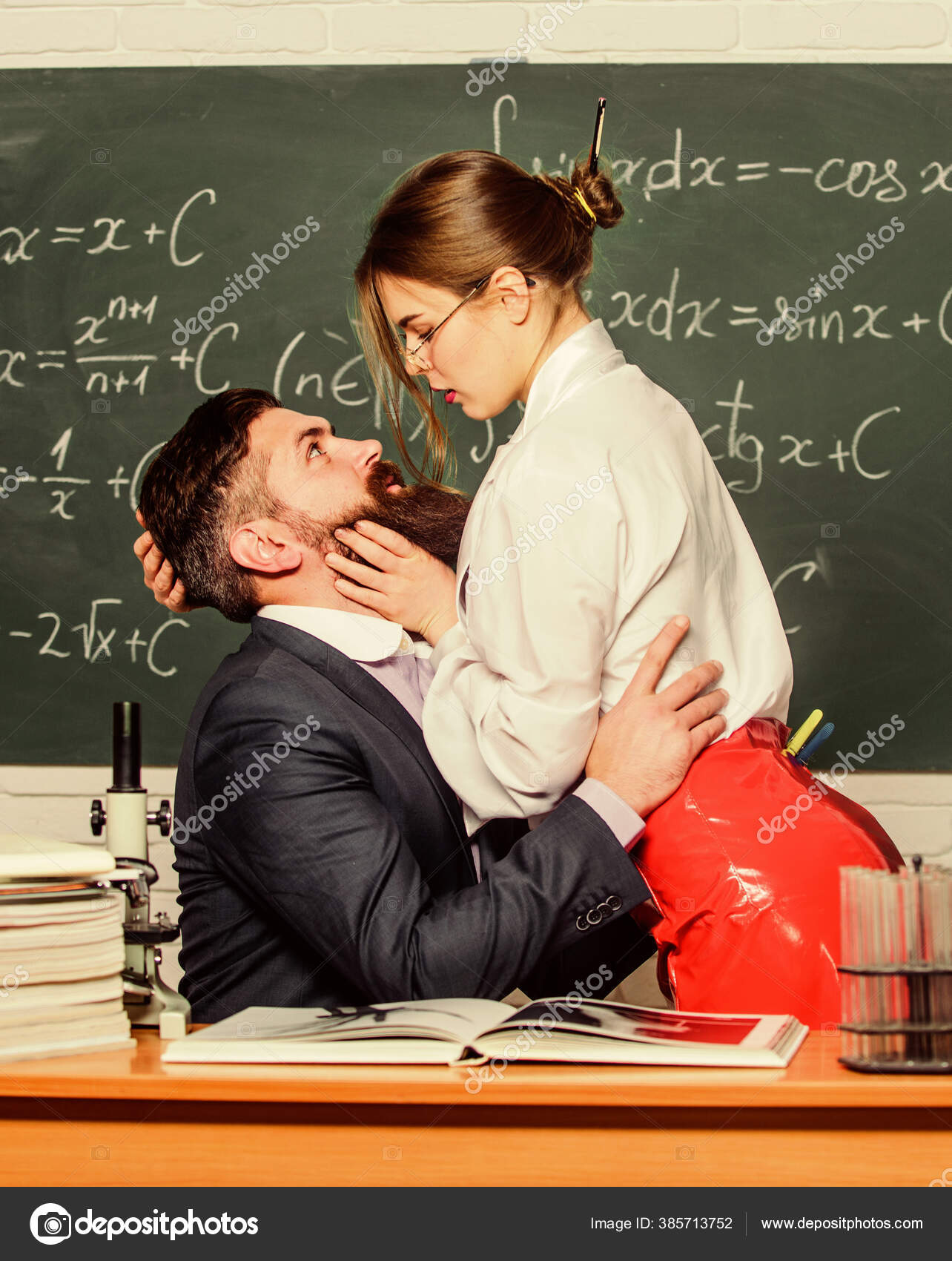 Teacher kissing student