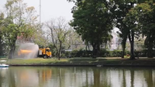 Watering Lawn Grass Trees Big Orange Water Tanker Truck Watering — Wideo stockowe