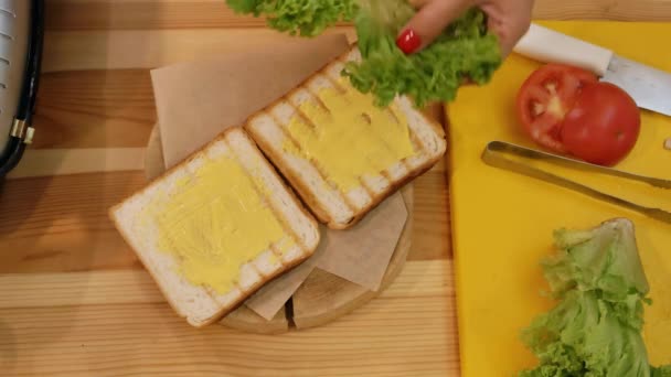 Cooking Sandwich Kitchen View Hand Takes Green Leaf Lettuce Puts — Stock Video