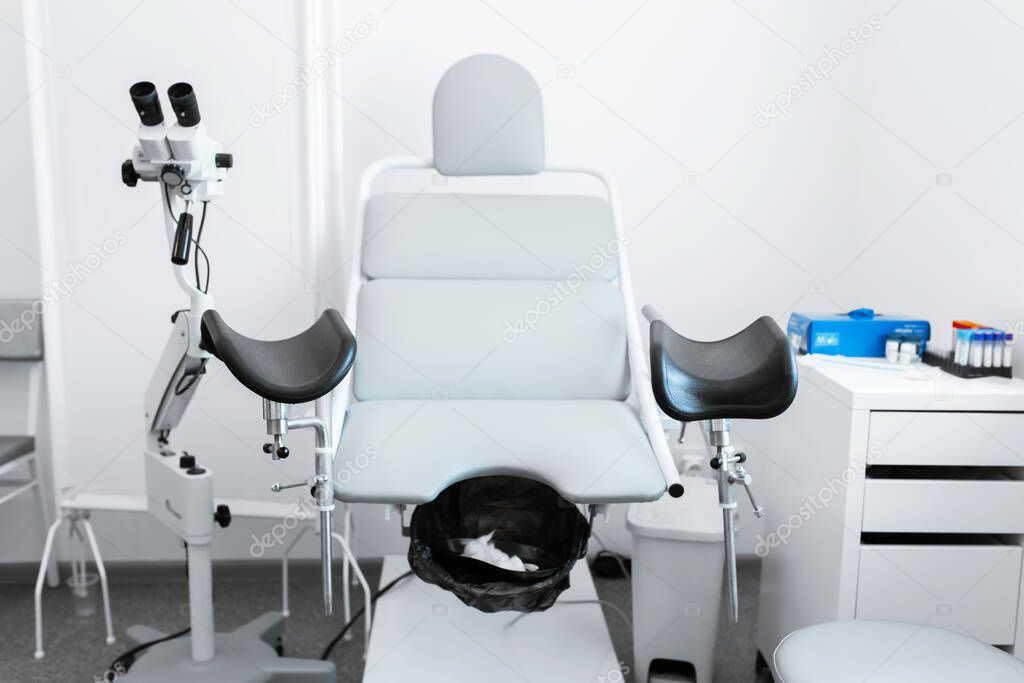 The interior of the gynecologist office. Gynecological chair.