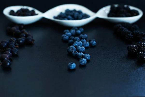 Set Different Types Black Berries White Plate Black Table Stylish — Stock Photo, Image