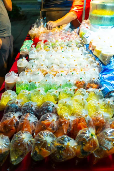Colored Desserts Plastic Bags Street Food Market Asia Unusual Asian — Stock Photo, Image