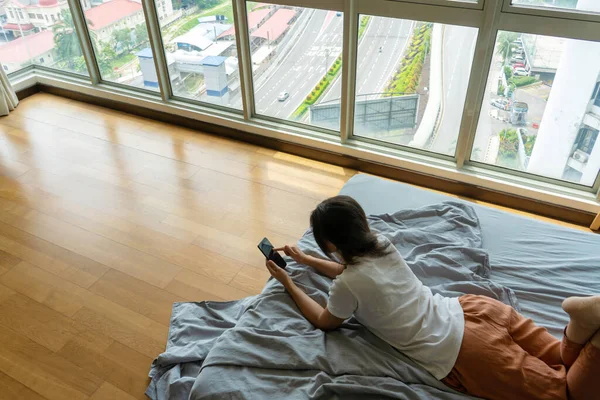 Beautiful Young Brunette Girl Texting Phone While Lying Bed Panoramic — Stock Photo, Image