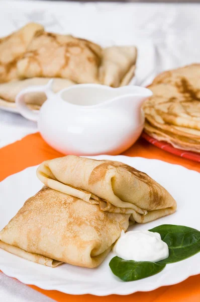 Stack of pancakes with fillings — Stock Photo, Image