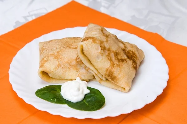 Stack of pancakes with fillings Stock Photo