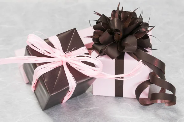 Gift boxes with bow and ribbons — Stock Photo, Image