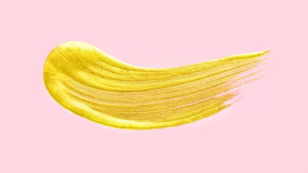 Золотая Косметическая Жидкая Помада Мазок Розовом Пастельном Фоне — стоковое фото