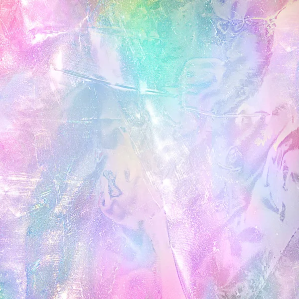 Gökkuşağı holografik folyo doku soyut. Pastel renklerle trendy sihirli arka plan.