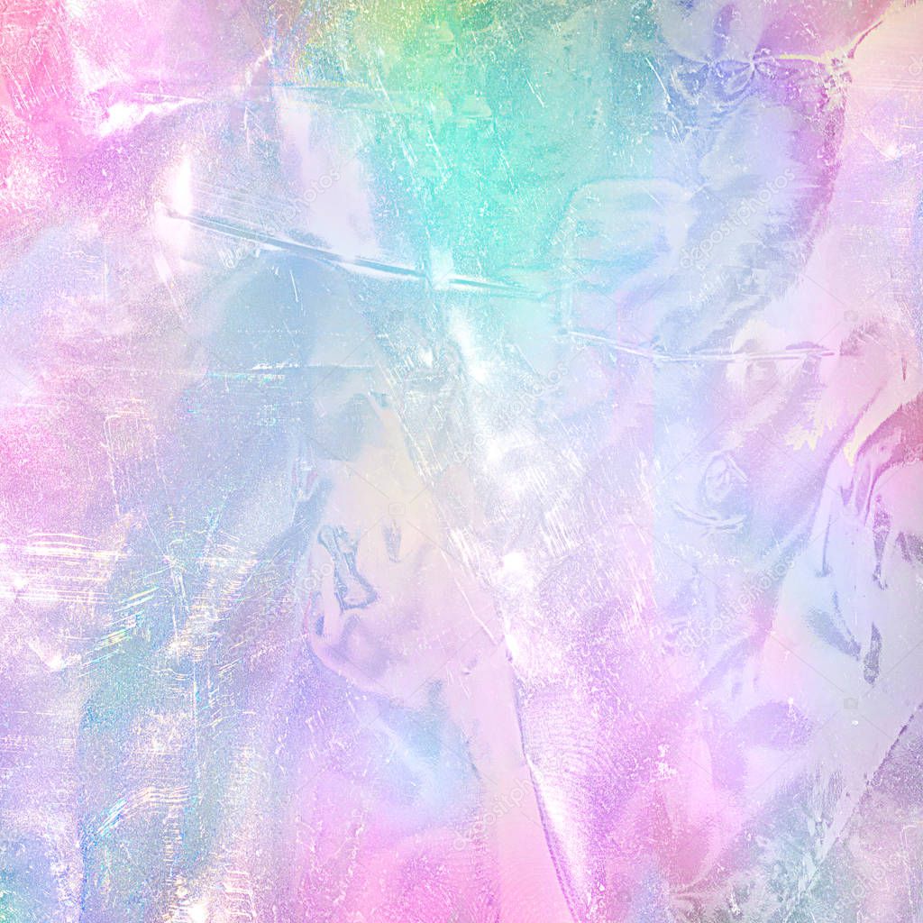 Abstract rainbow holographic foil texture. Trendy magic background with pastel colours.