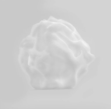 Gri arka plan üzerinde yumuşak beyaz köpük.