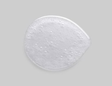 Kozmetik sıvı kollajen serum gri arka plan üzerinde jel.