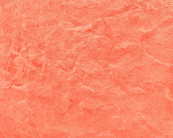 Papierstruktur für Hintergrund in der trendigen lebenden Korallenfarbe. — Stockfoto