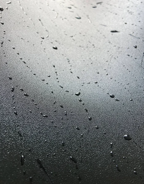 Gotas de agua en negro — Foto de Stock