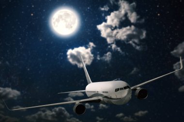 gece gökyüzü ve güneş arka planlar üzerinde uçak uçar