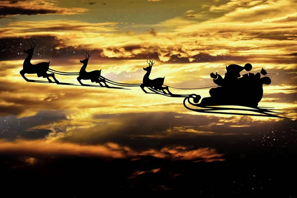 Silueta de un gótico volador santa claus sobre el fondo del cielo nocturno. —  Fotos de Stock