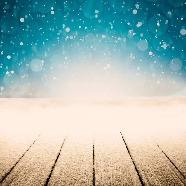 Uno sfondo natalizio invernale con neve sul legno — Foto Stock