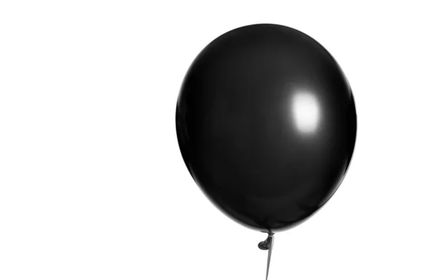 インフレータブルブラックバルーン 黒い金曜日の白い背景の写真 — ストック写真