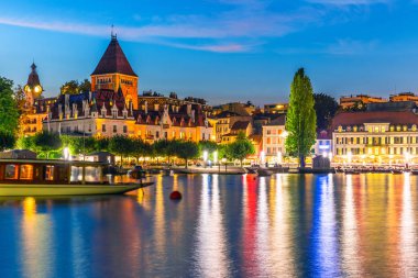 Scenic summer night view of the Old Town of Lausanne, Switzerland clipart