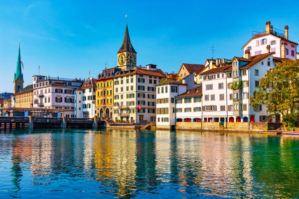Scenic summer view of the Old Town pier architecture and Limmat river embankment in Zurich, Swizerland