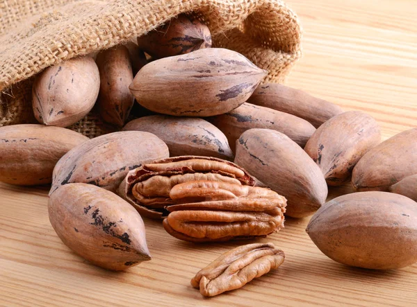 Pecan Nuts Burlap Sack Bag Close Wooden Background — Stock Photo, Image