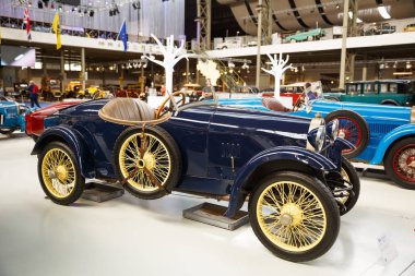 Brussels, Belgium - August 25, 2015 - Autoworld Museum, old cars collection showing the history of automobiles from the beginnings. clipart