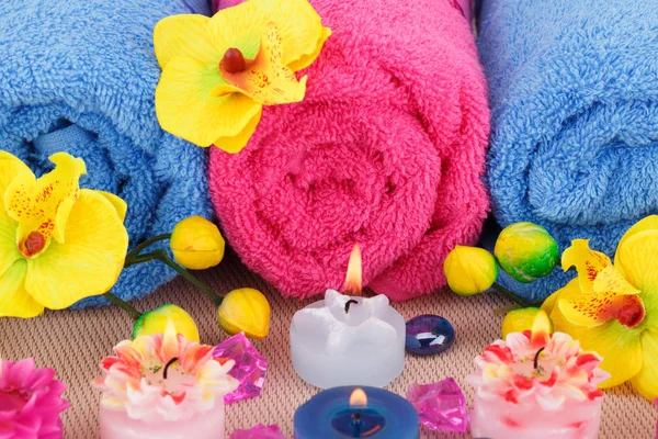 Spa Set Towels Candles Flowers Bamboo Background — Stock Photo, Image