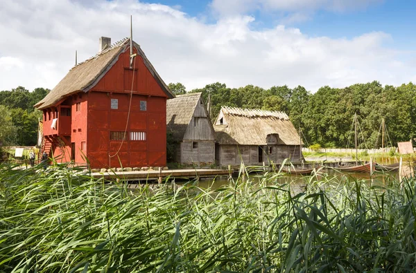 The medieval houses and boats in The Middle Ages Center, the experimental living history museum in Sundby Lolland, Denmark.