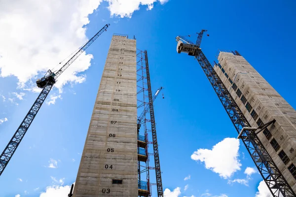 Construction Site Cranes Unfinished Buildings Blue Sky Background — Stock Photo, Image