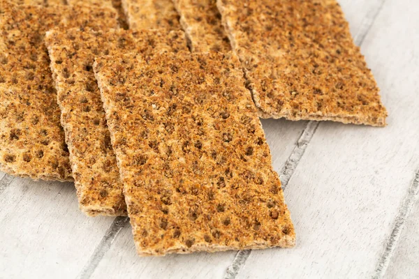 Montón Galletas Saladas Con Especias Sobre Fondo Madera Gris — Foto de Stock