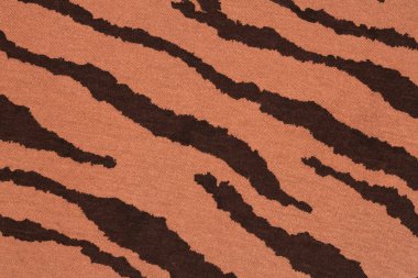 Arkaplan olarak desenli kahverengi kumaş dokusu.