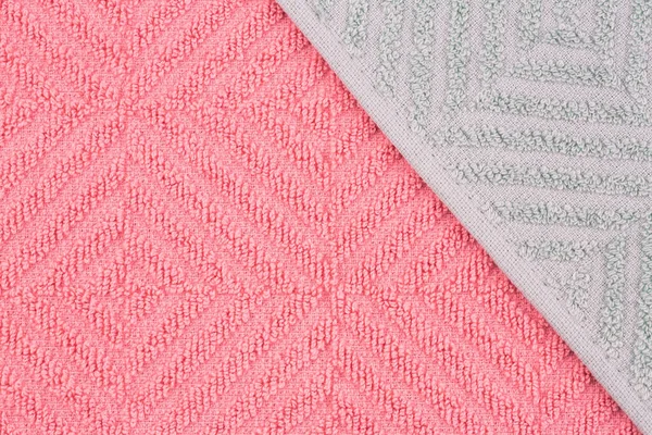 粉红和灰色毛巾的质地为背景 — 图库照片