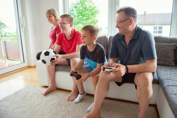Grandparents Son Grandson Playing Computer Game Emotionally Home Sofa — Stock Photo, Image
