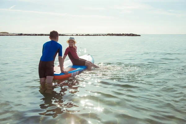 Two Happy Siblings Teen Children Neoprene Suits Playing Having Fun — Stock Photo, Image