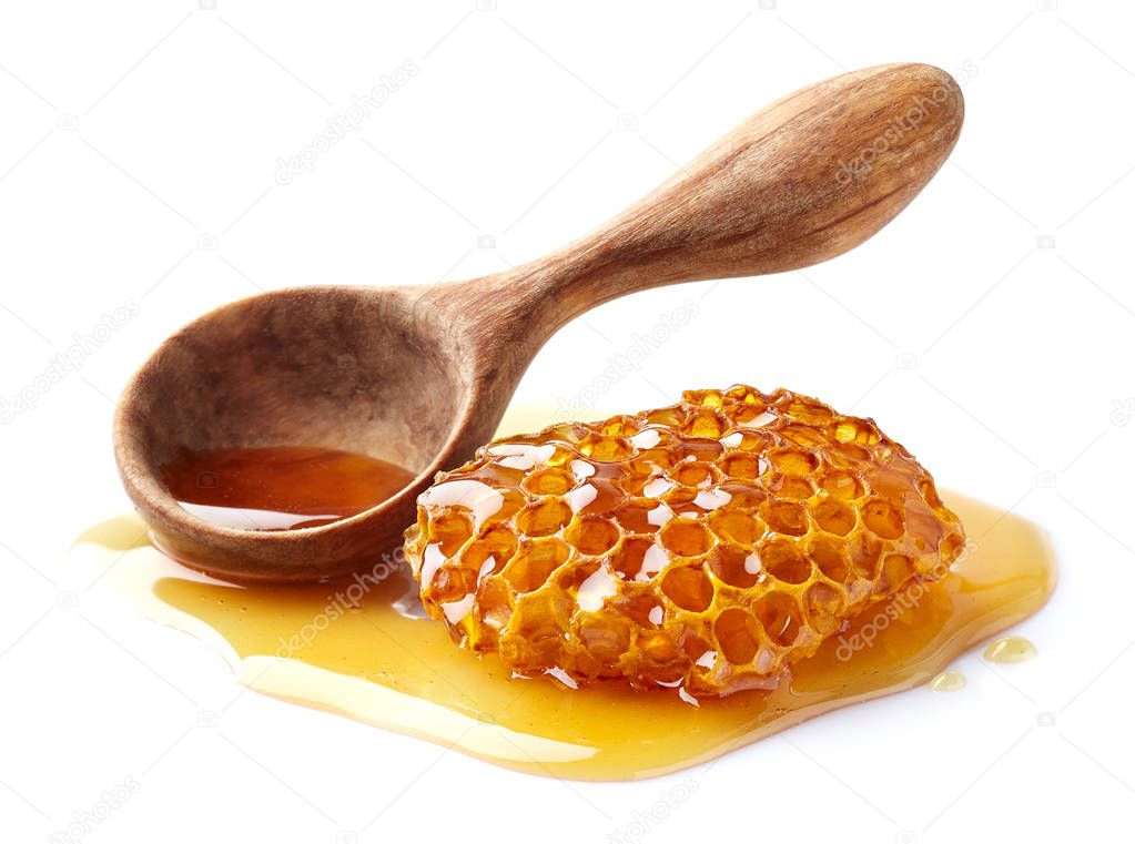 Honeycomb with spoon in closeup