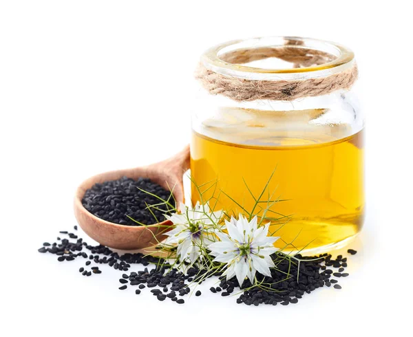 Aceite Comino Negro Con Flores — Foto de Stock