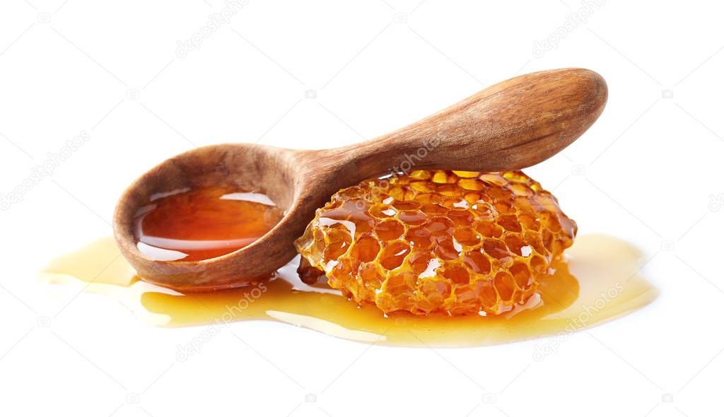 Honey with wooden spoon 