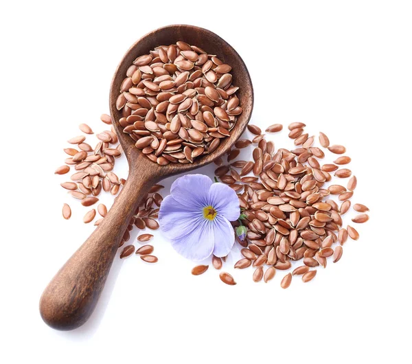 Flax seeds in wooden spoon on white background — Stock Photo, Image
