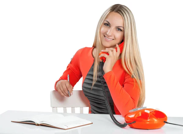Beautiful smiling young businesswoman talking with phone at the — Stock Photo, Image