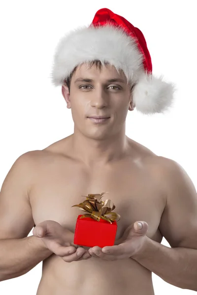 Very close up portrait naked muscular man with santa cap holding — Stock Photo, Image
