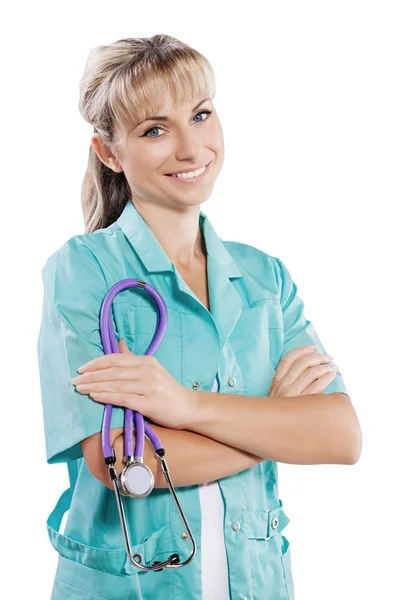 Piękne kobiece lekarz uśmiechający się skrzyżowane ramiona na białym tle portret — Zdjęcie stockowe