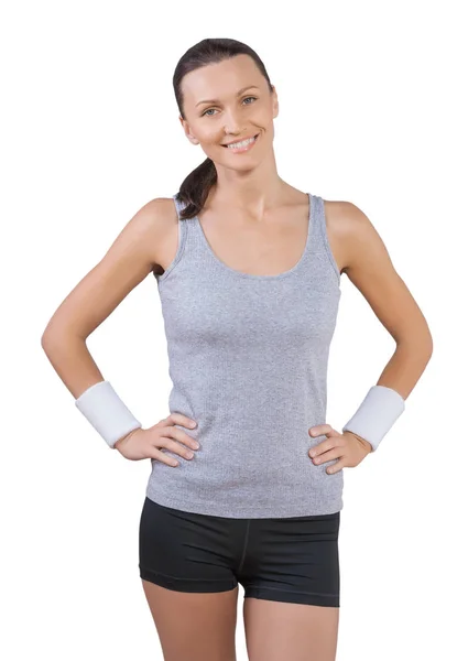 Beautiful sporty female with arms on hips wearing sports clothes — Stock Photo, Image