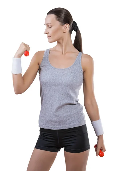 A sports woman with little red dumbbells isolated — Stock Photo, Image
