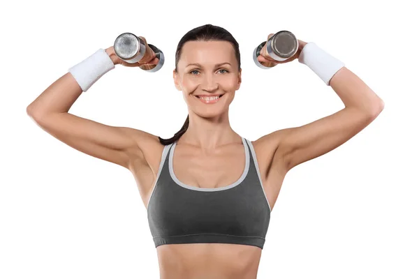 A sports woman with dumbbells looking at camera smiling isolated — Stock Photo, Image