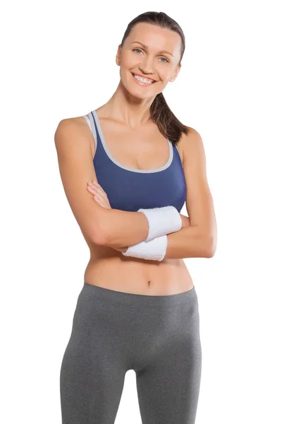 Krásné sportovní žena nosí sportovní oblečení s překřížením rukou — Stock fotografie