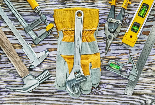 Construction tools for house repairing on wooden board — Stock Photo, Image