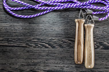 Antika ahşap tahta üzerinde ip atlama.