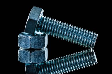 Paslanmaz inşaat fındık screwbolts siyah arka plan üzerine