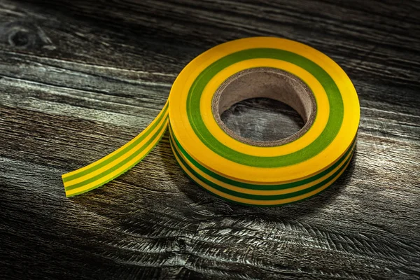 Yellow Insulating Tape Vintage Wooden Board — Stock Photo, Image