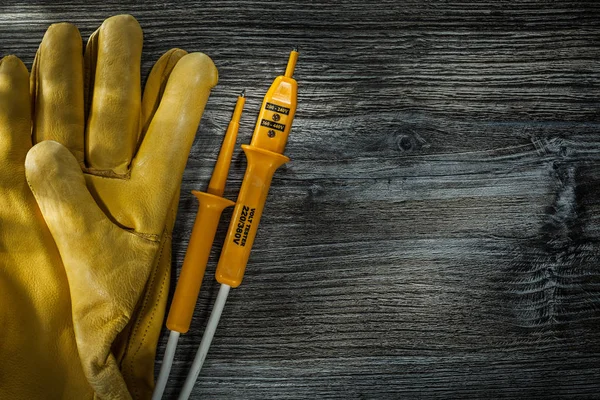 Electric Tester Leather Protective Gloves Wooden Board — Stock Photo, Image